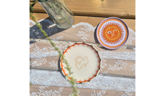 Mix en Match de kleurrijke bordjes vogel en zon van all the luck in the world.