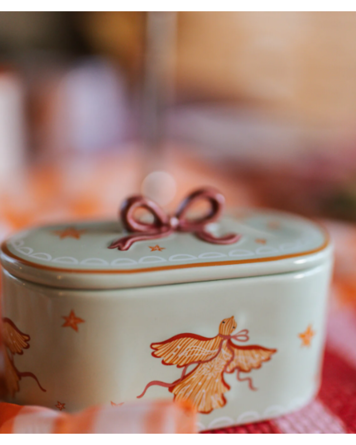 Keramisch kleurrijk potje van all the luck in the world met strik detail