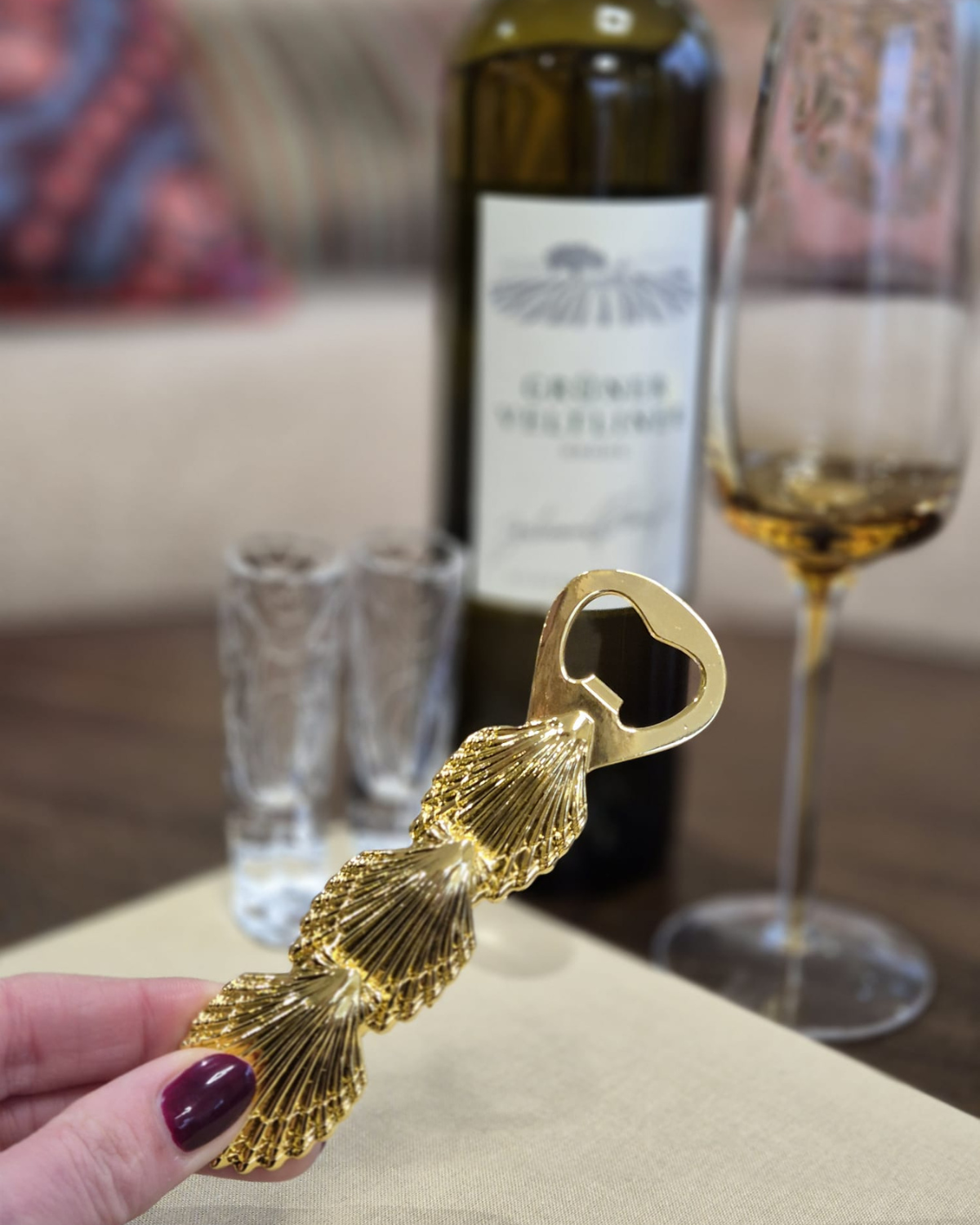 Gouden flesopener goud met schelpen van Here's How