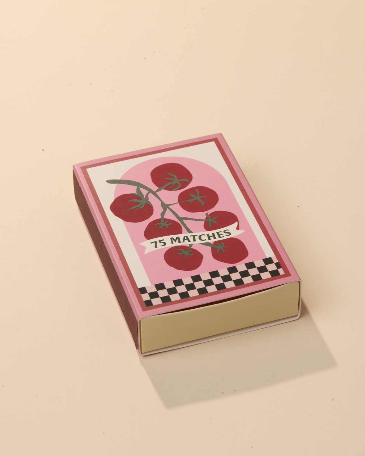 A Dopo Boxed Matches Tomato Vine veiligheidslucifers gebruikt als charmant woonaccessoire op tafel