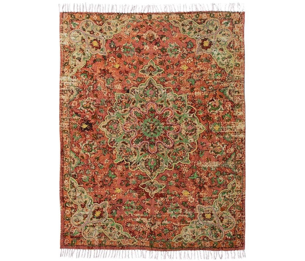 Handgemaakt plaid Julie van Imbarro met speels, kleurrijk dessin en kwastjes, zacht en cosy woonaccessoire voor een warme en stijlvolle zithoek.